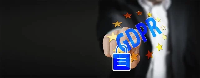 Person touching a glowing GDPR icon, symbolizing Cost Reduction in Healthcare Operations.