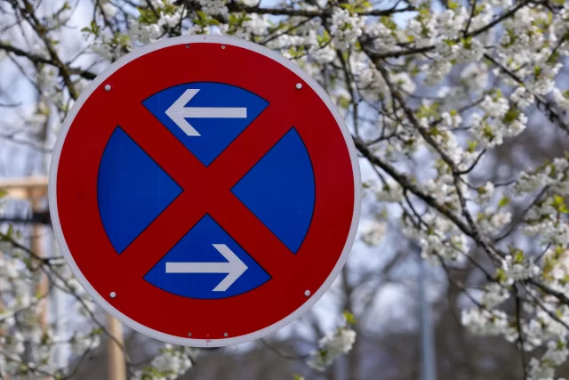 No stopping zone traffic sign, signaling changes relevant to regulatory compliance updates EU.