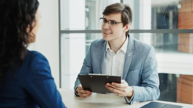 Professional interview session discussing Swiss PIM implementation and strategy.