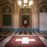 The grand interior of the Swiss Federal Palace, reflecting the stability associated with Swiss Private Medical Insurance.