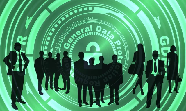 Silhouettes of professionals surrounding a data security icon representing Health Info Management in Zürich.