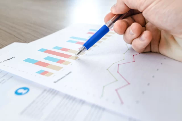 Professional reviewing a business chart regarding the medical devices ordinance in Switzerland.